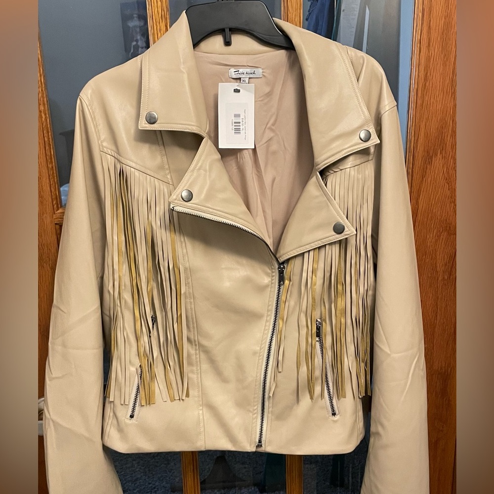Vegan leather Moto jacket with fringe.